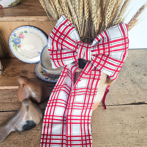 Decorative bow for wreath enhancement or tree hanging.
