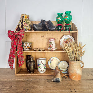 Plush padded festive bow with hanging ribbon
