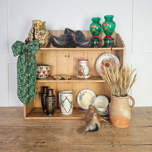 Handmade holiday bow with brass ring perfect for door hanging.
