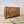 Large wooden trunk with storage space, ideal for use in bedroom or hallway
