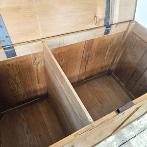 Country house storage chest with divided interior and panelled pine sides, ideal for keeping household items organised.

