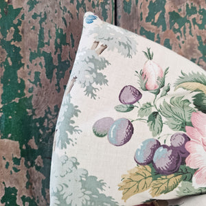 Elegant floral bow on distressed wood, perfect for country style settings.