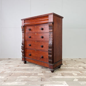 19th-century tallboy dresser with five drawers and a rich reddish-brown wood finish.
