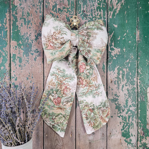 French-inspired decorative bow in muted tones
