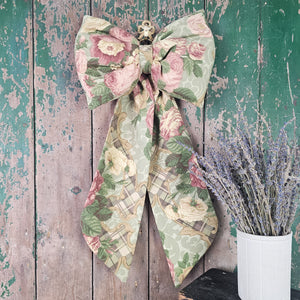 Handmade vintage fabric bow with velvet ribbon
