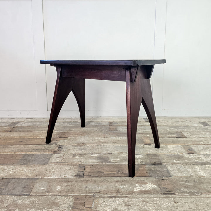 "Vintage mahogany side table with protective wax finish."
