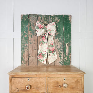 padded vintage bow with velvet ribbon and brass hoop