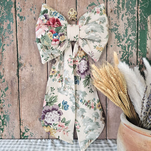 Vintage Sanderson fabric bow with classic tapered tails.