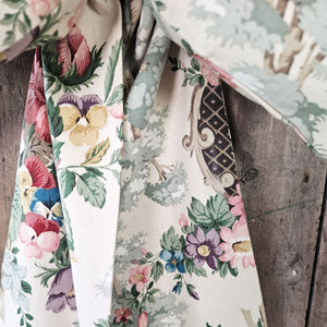 Decorative floral bow with soft cushioned body to maintain structure.