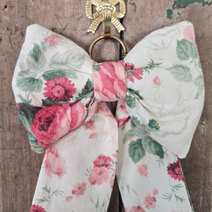 vintage-style padded bow for cupboard handles
