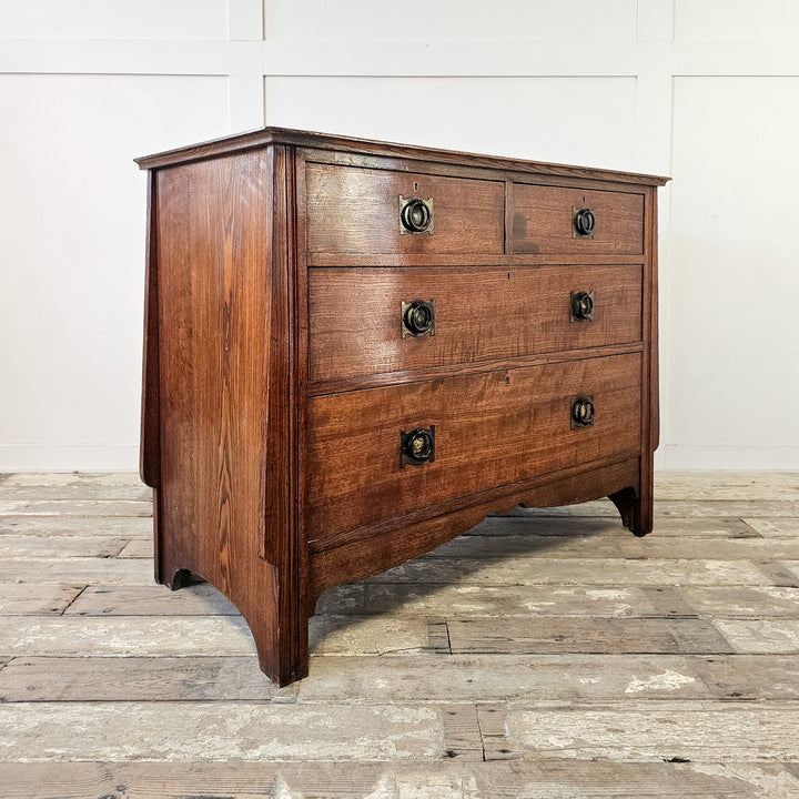 1900s oak storage chest with decorative apron
