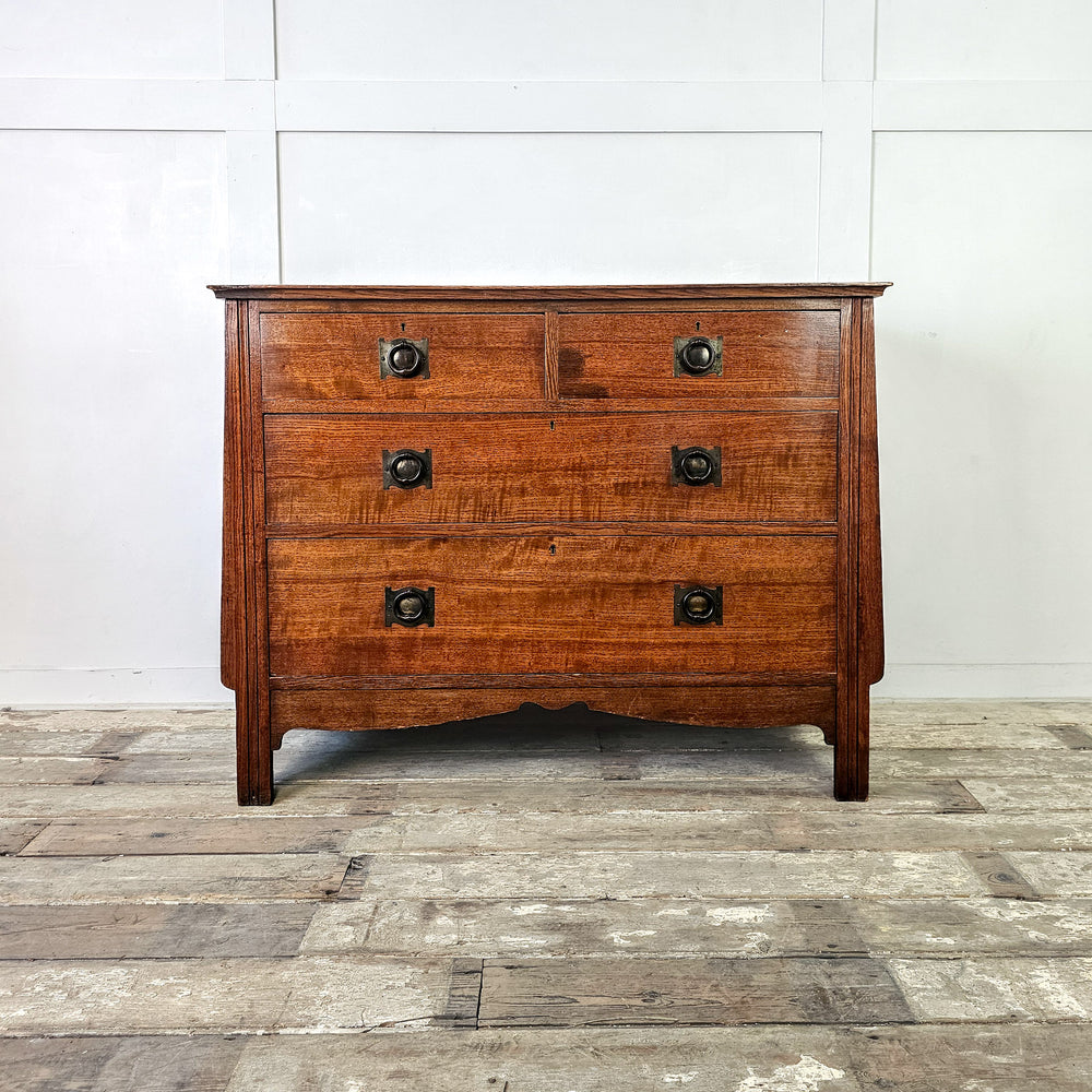 Early 20th century oak drawers with shaped apron
