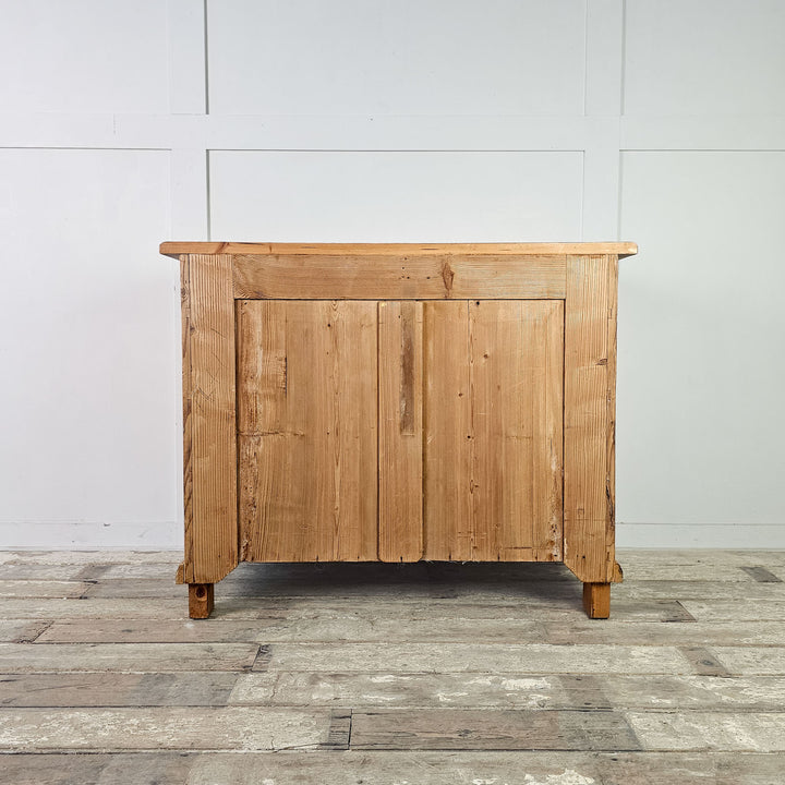 Vintage bedroom storage solution with five drawers.