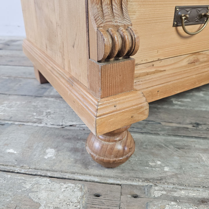 Continental sideboard with unique drawer handles.