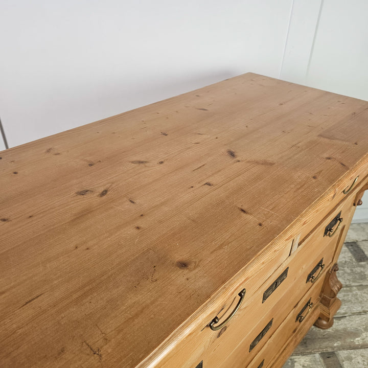 Pine chest of drawers for versatile home use.
