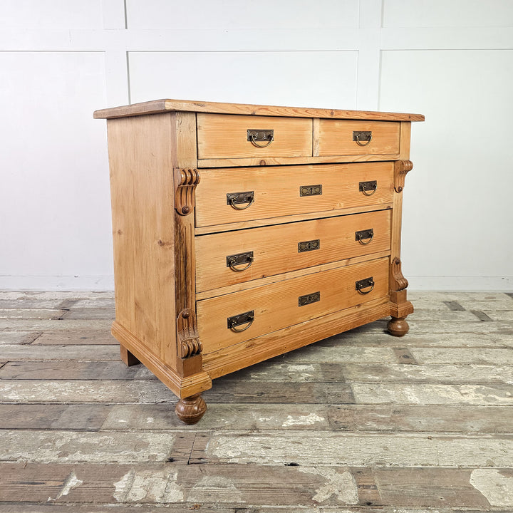 Five-drawer chest suitable for bedroom or living room.