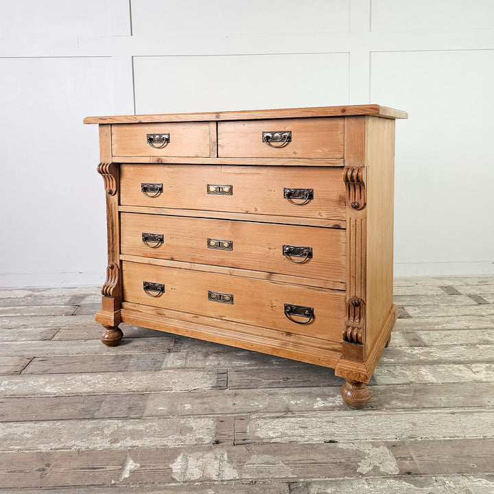 Vintage chest with decorative handles and escutcheons.