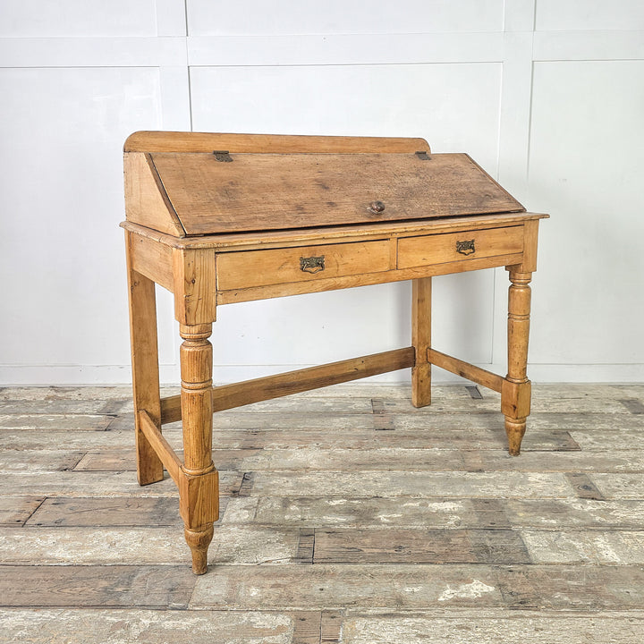 Late 19th century pine writing desk with storage drawers
