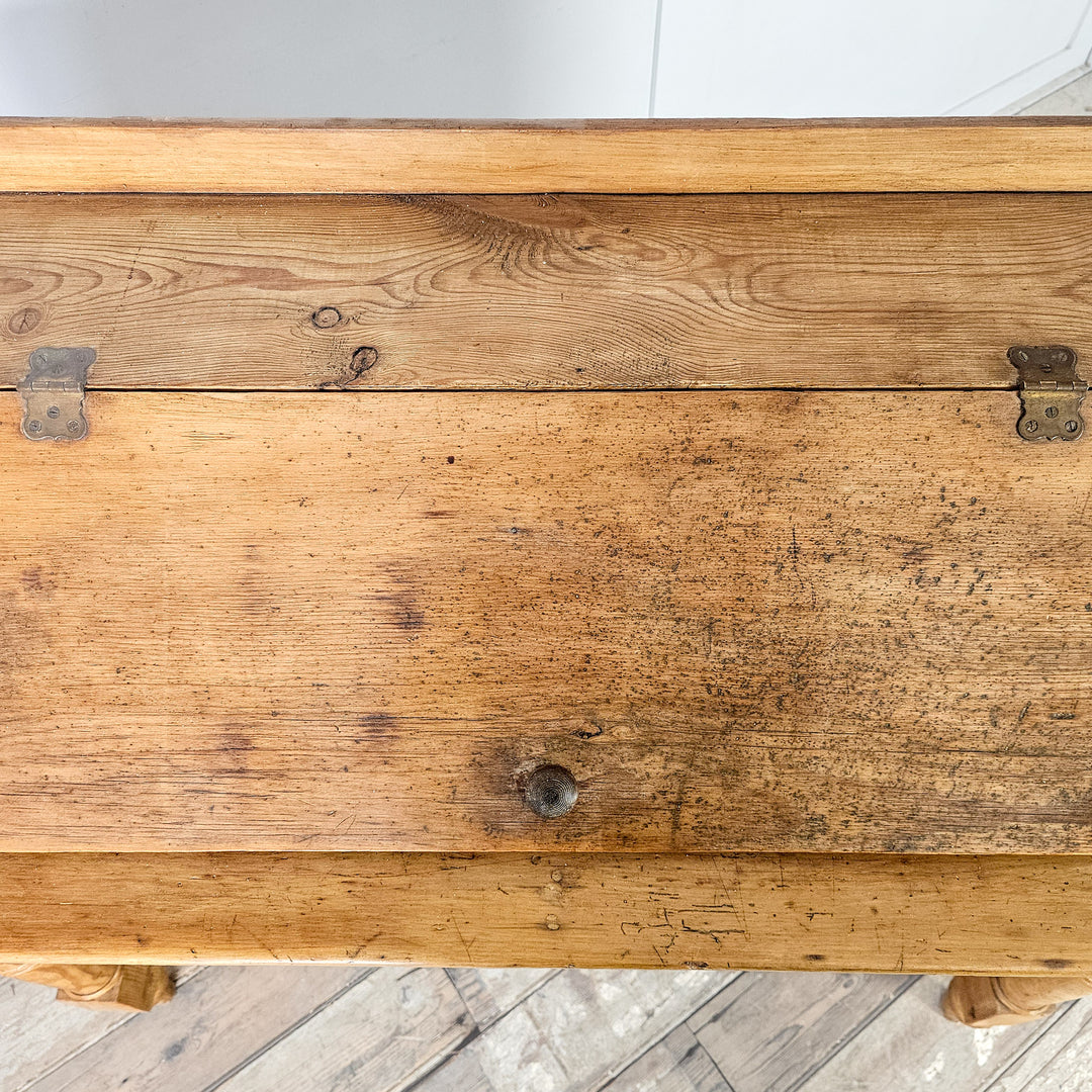Antique writing desk in solid pine with brass-style handles
