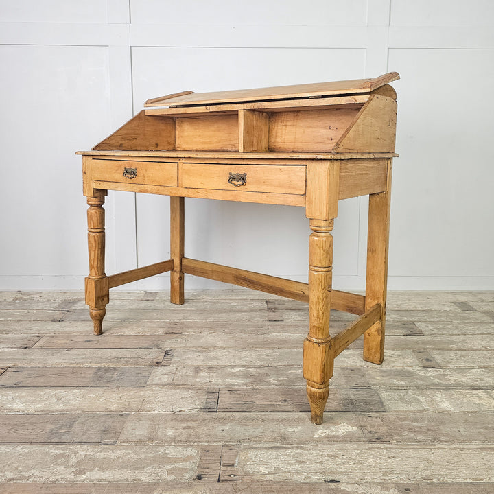 Rustic pine hall table with hinged lid and flat writing surface
