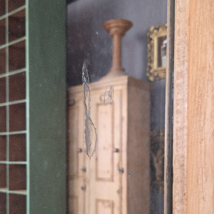 Antique Victorian triple wardrobe in pine, featuring a mirrored door and traditional brass fittings. This late 19th century pine wardrobe combines multiple drawers, hanging space, and enclosed storage, making it a fine example of functional Victorian pine furniture.