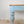 A Victorian pine table dating from the 19th century with a scrubbed pine top and a painted base in a soft powder blue. Raised on turned legs with a single drawer, it is suitable for use as a kitchen or dining table.