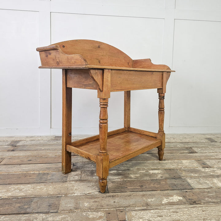 Rustic side table with antique character

