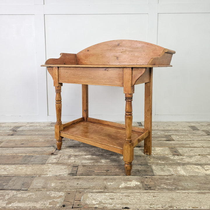 Antique English Pine Washstand with Victorian-era design, drawers, and lower shelf