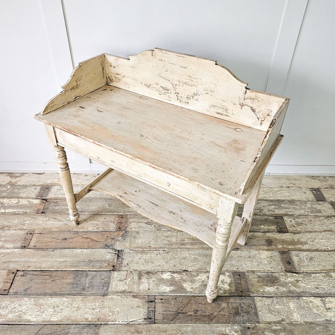 Antique pine washstand with Victorian charm