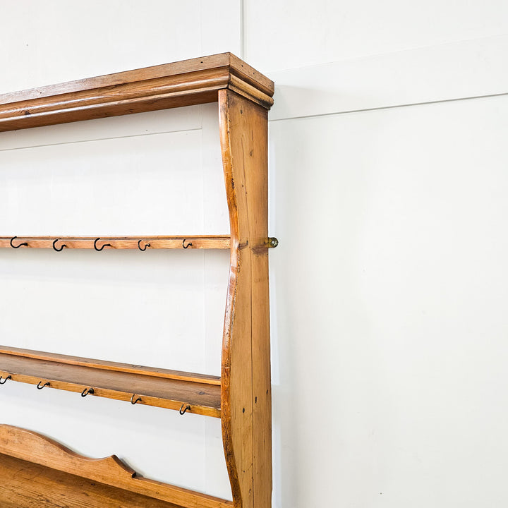 Solid English pine wall rack from the 19th century.