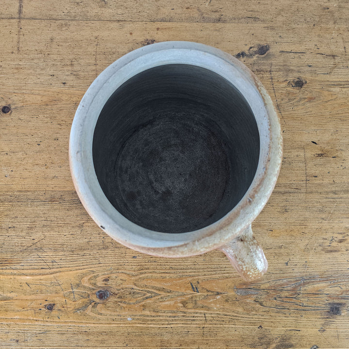 Versatile antique rillette pot suitable for display or as a functional planter.