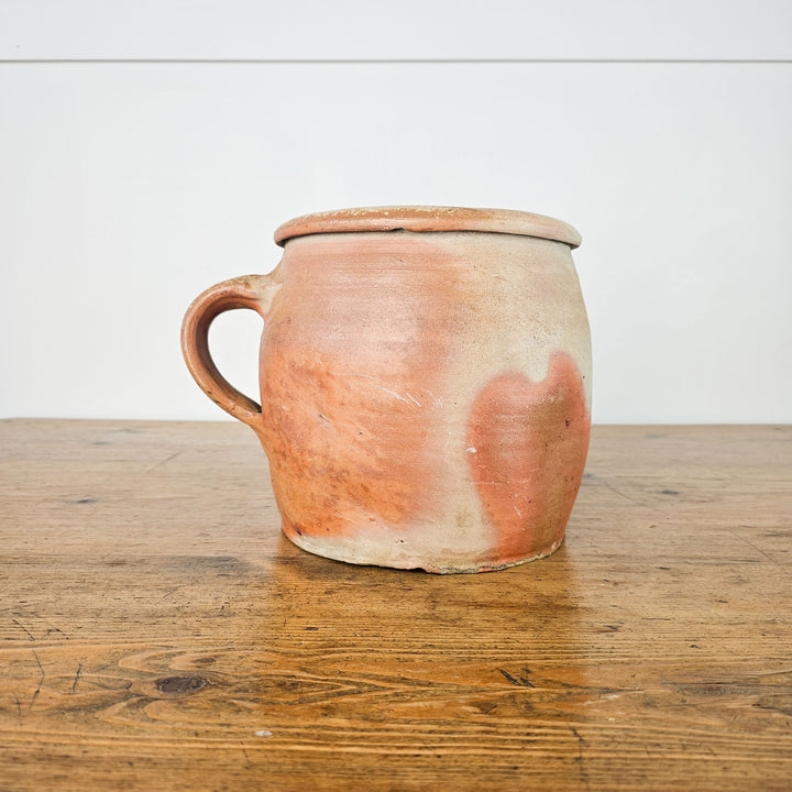 Rustic antique French rillette pot with a soft glazed finish and handle.