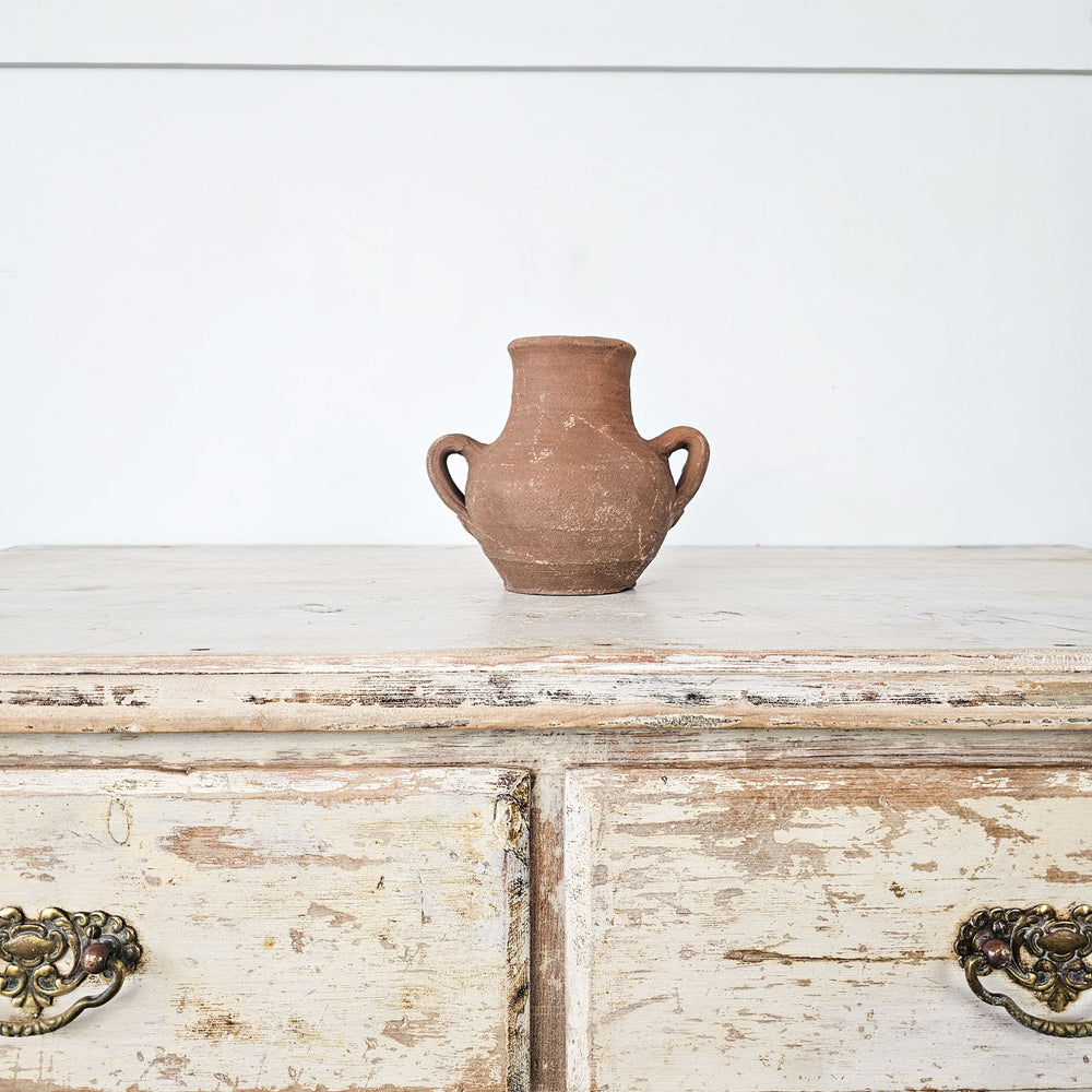 Rustic Turkish vessel crafted from earthenware with charming patina.