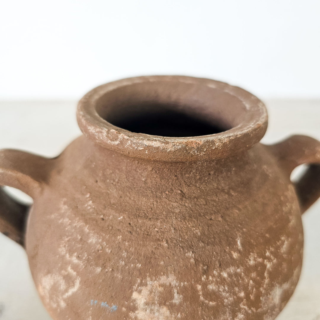 Small earthenware pot with rustic charm and Turkish craftsmanship