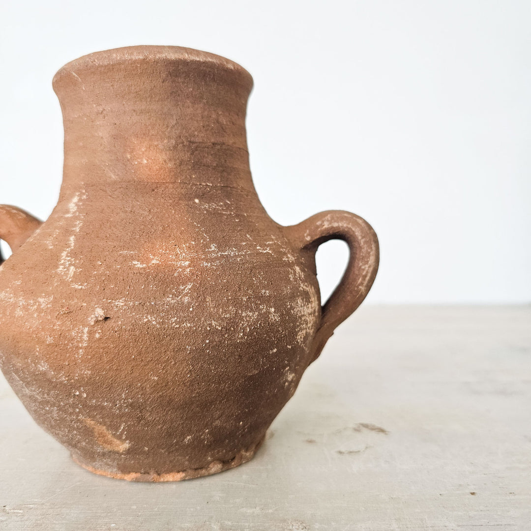 Rustic Turkish earthenware pot, adding character to any room.