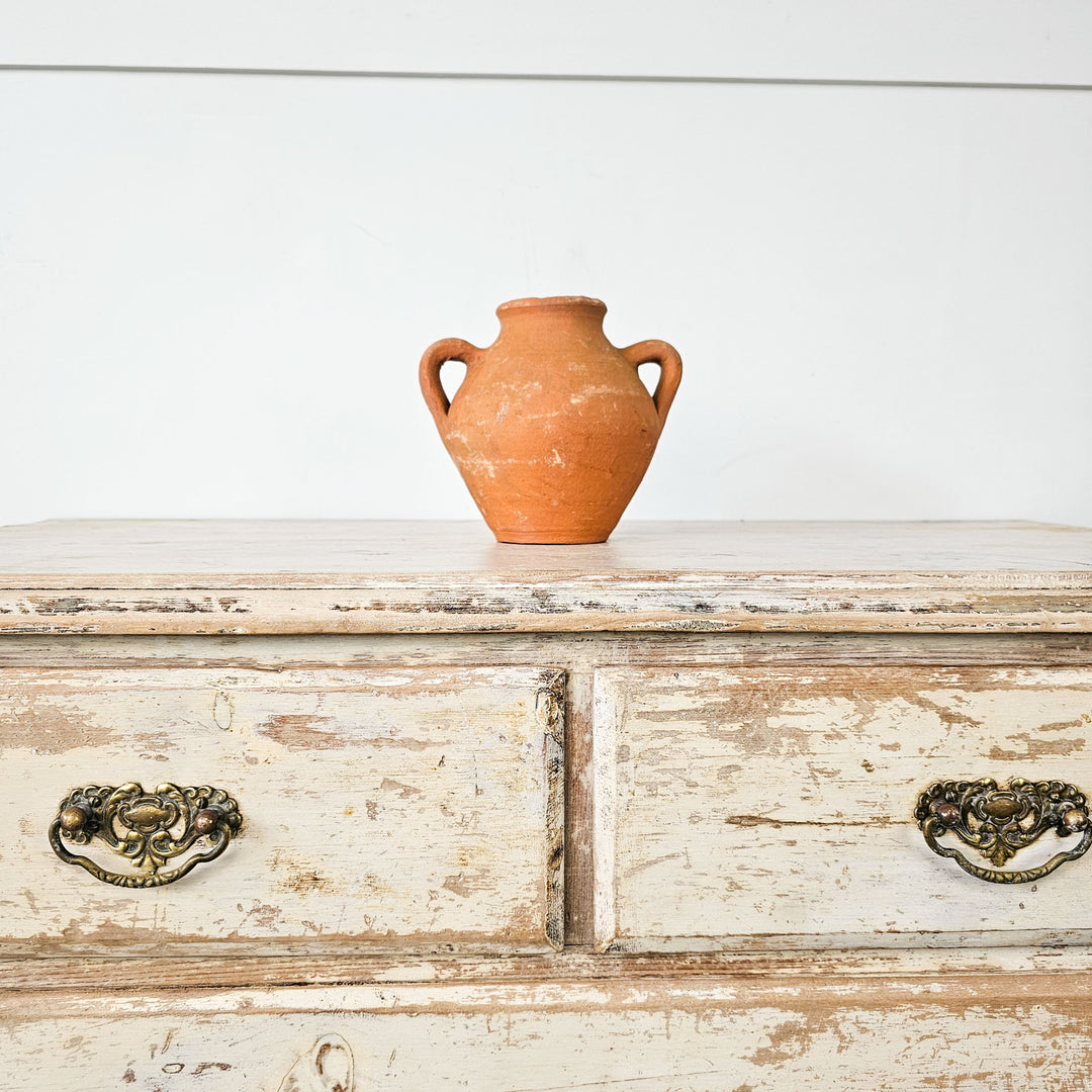 Handcrafted Turkish terracotta pot, ideal for displaying dried flowers.