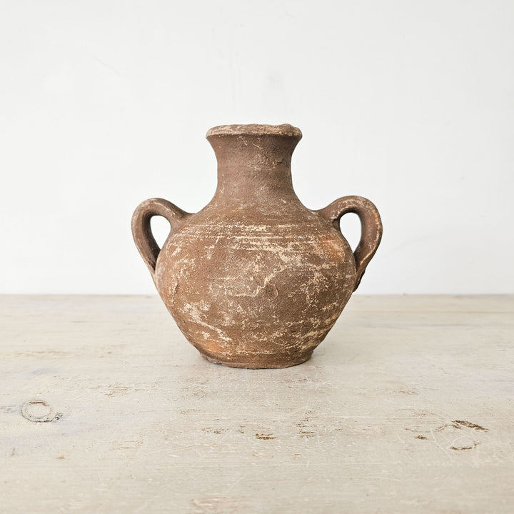 Handcrafted earthenware vessel from Turkey, ideal for displaying dried or faux flowers.