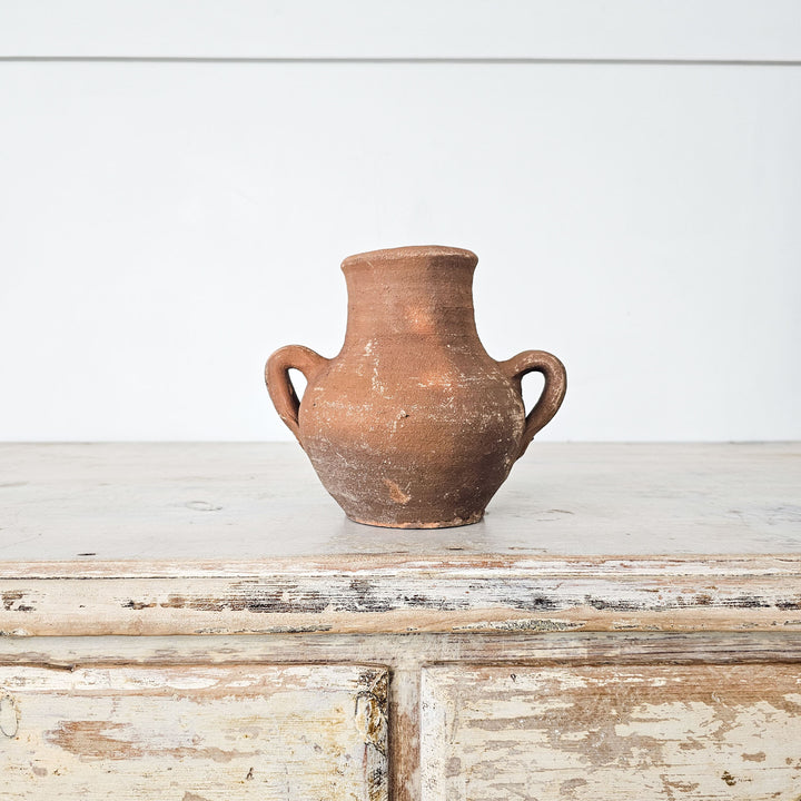 Small earthenware vessel handmade in Turkey, perfect for home décor.