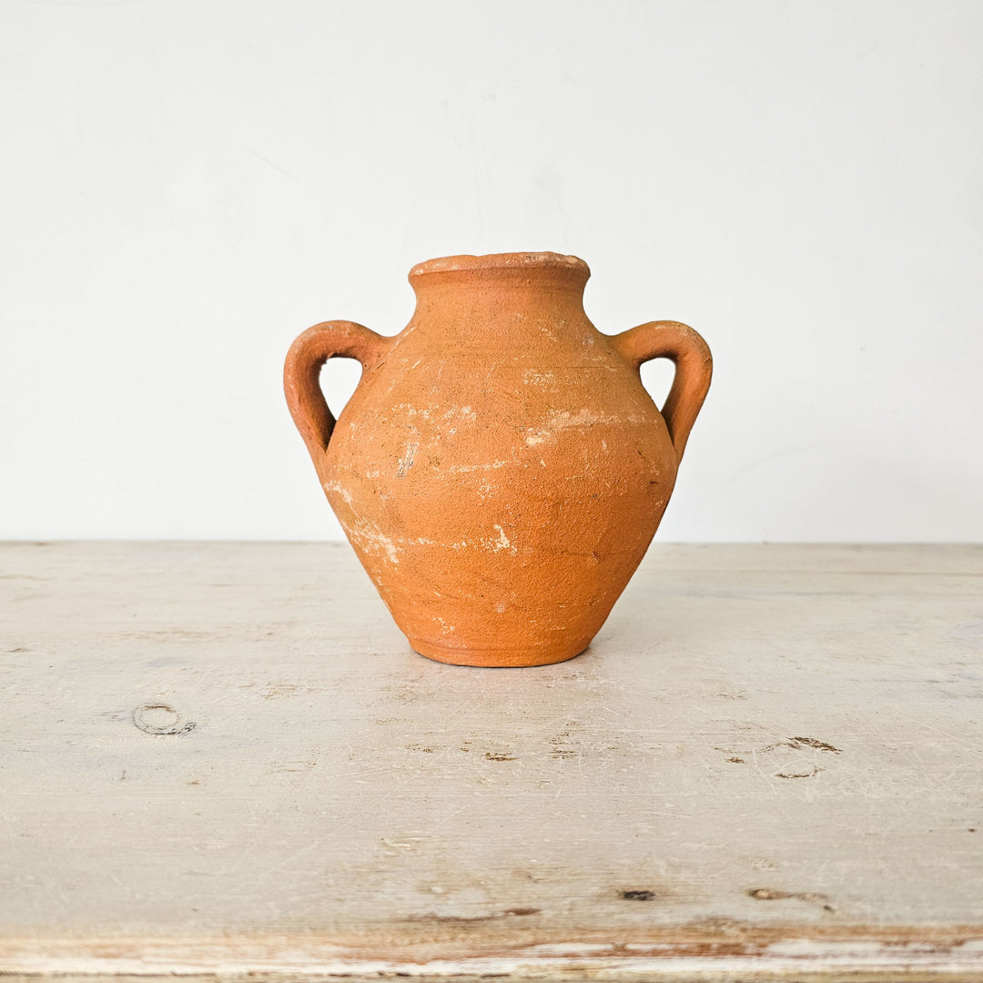 Rustic Turkish pot with authentic patina, adding warmth to any room.
