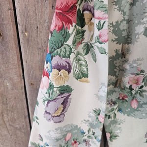 Floral bow featuring old-world charm with a natural cream base.