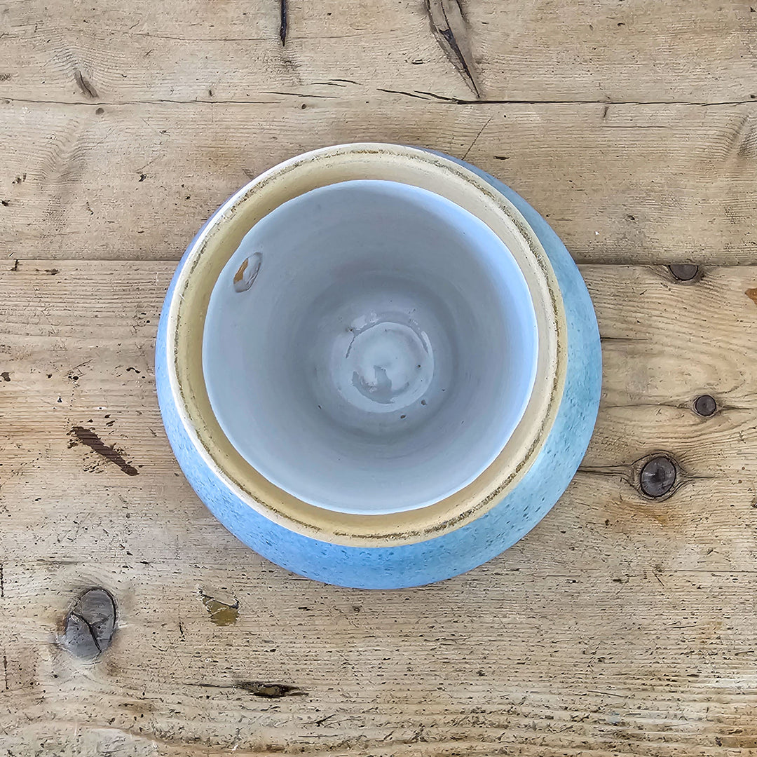 Handmade pottery dish with markers mark