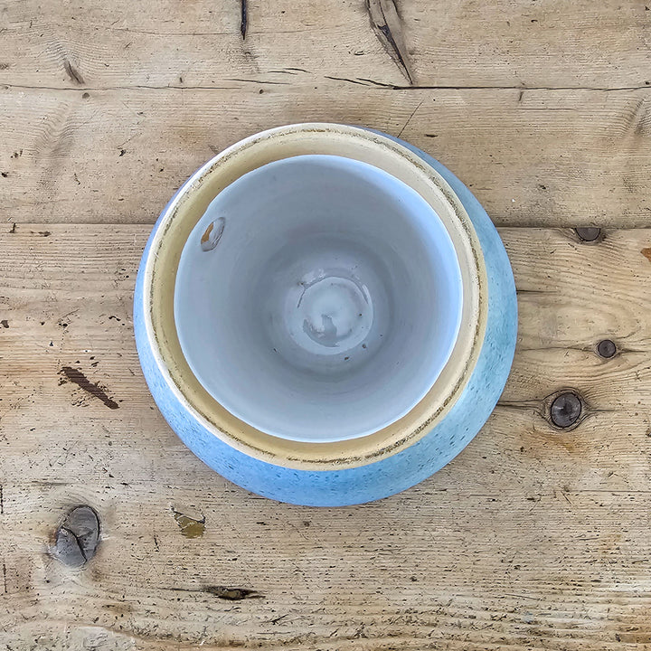 Handmade pottery dish with markers mark