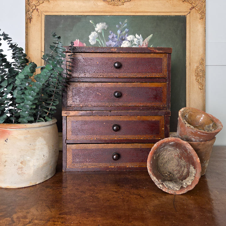 Victorian furniture in pine with two drawers, original paint and simple wooden knobs. The warm colours and visible patina make these antique storage drawers a decorative and useful piece for farmhouse interiors.