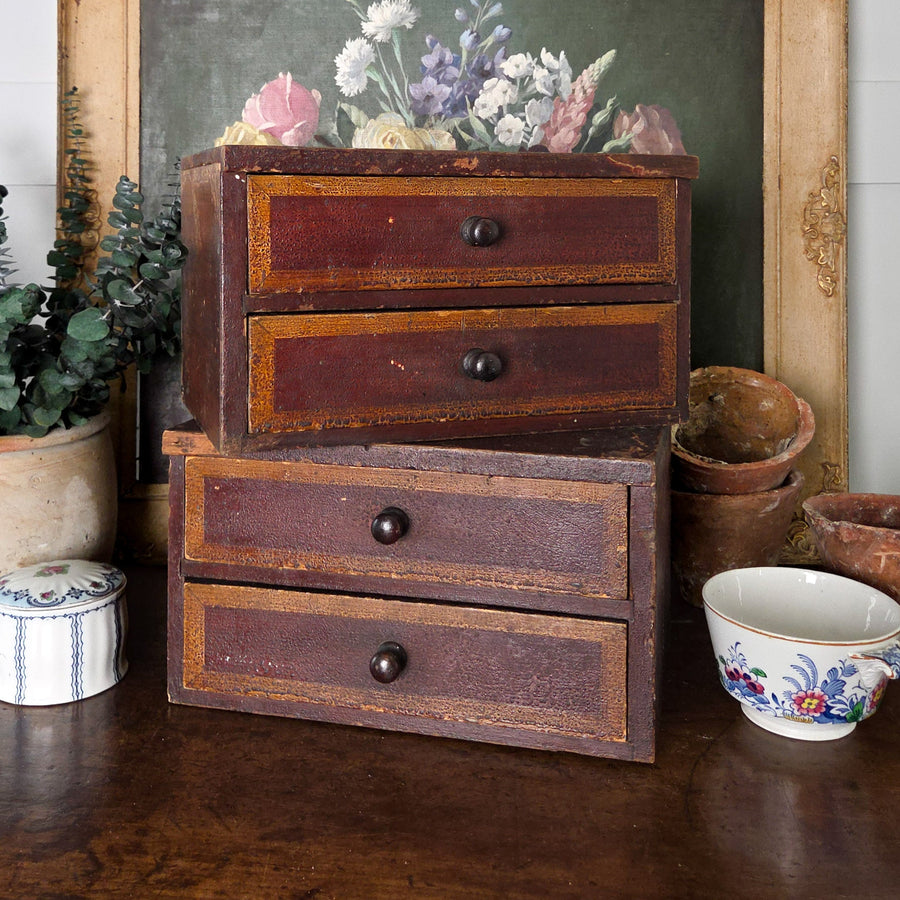 Antique Victorian tabletop drawers featuring two drawers with turned knobs and painted fronts in ochre and red-brown tones. Ideal as a small chest of drawers for country house style or rustic decor