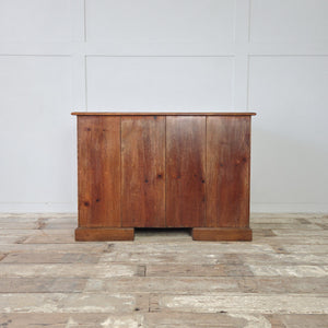 Antique cherrywood writing desk with Aesthetic Movement drop pendant handles dating to 1870 to 1900