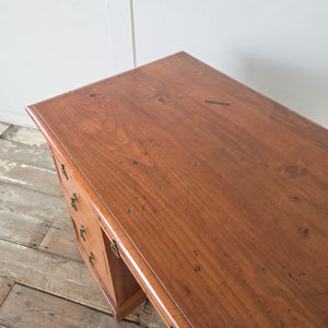 Victorian cherrywood kneehole desk with original brass Aesthetic Movement handles and plinth base
