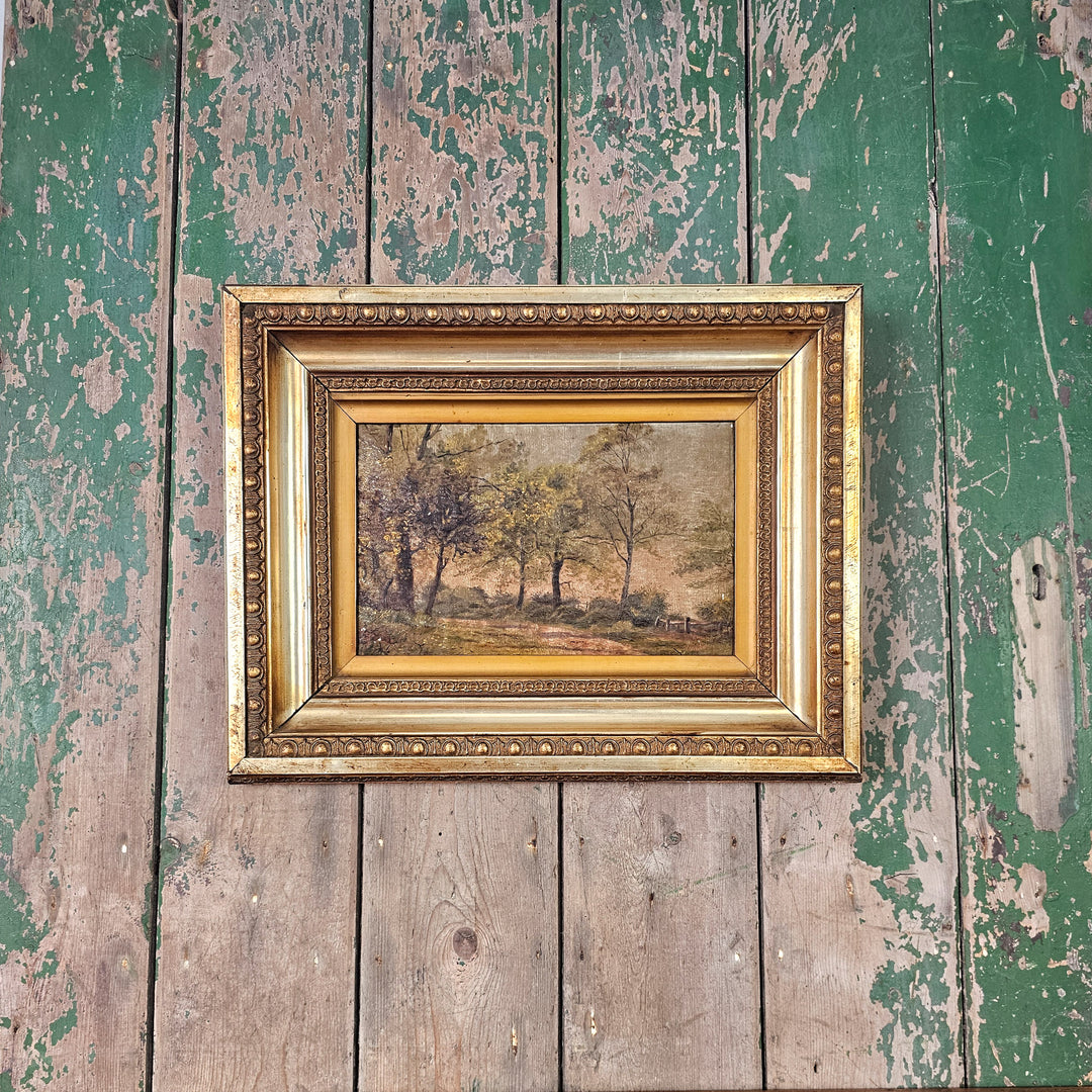 Antique 19th century landscape painting in decorative gold gilt frame, rural English scene with soft brushwork and subdued tones, ideal for hallway, bedroom or living room wall art display.
