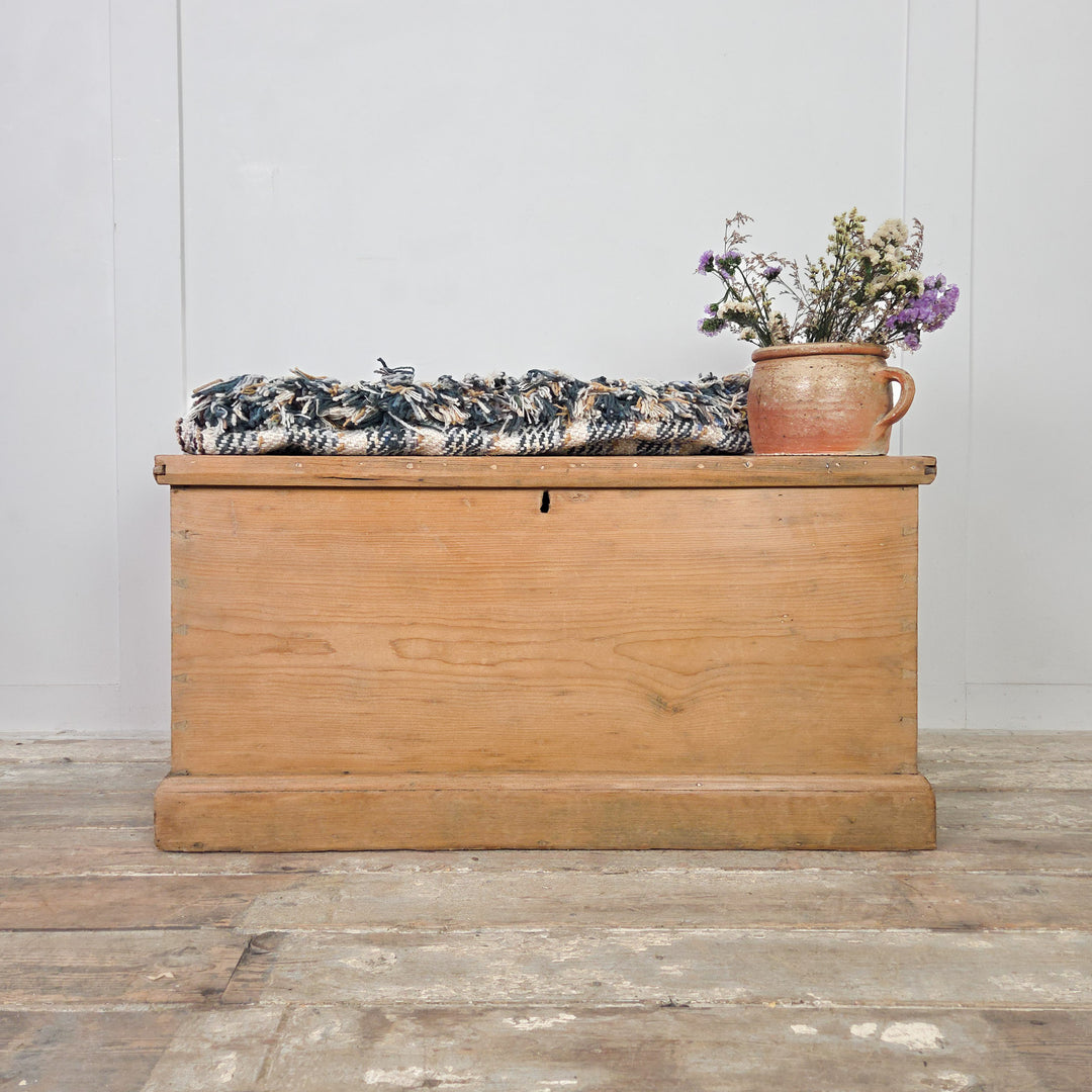 A Victorian pine blanket chest with hinged lid, internal drawers and candle box, finished in clear wax to highlight the grain. A rustic antique storage chest or blanket box that also works as a toy box or low farmhouse coffee table.