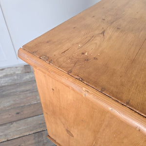Victorian antique pine chest of drawers, 19th century in origin, with four drawers, turned bun feet and waxed pine patina. This piece offers practical storage and timeless design, making it well suited for farmhouse bedrooms, rustic living rooms, or as a kitchen sideboard in country house style interiors that favour characterful antique pine furniture.