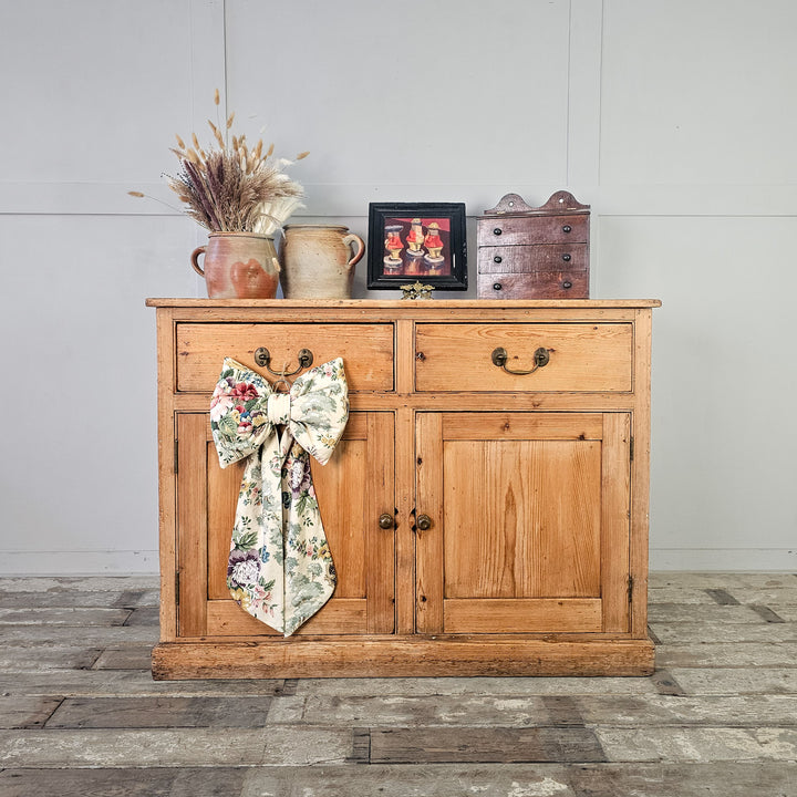9th-century pine cupboard sealed with clear wax.